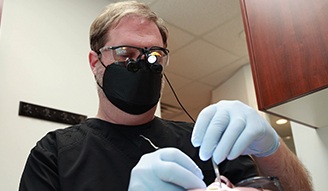 Doctor Bell treating a dental patient