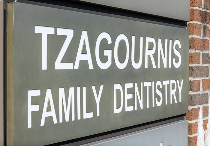 Sign reading Tzagournis Family Dentistry