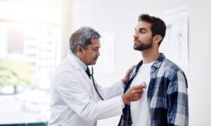 Man attending checkup with his primary care doctor